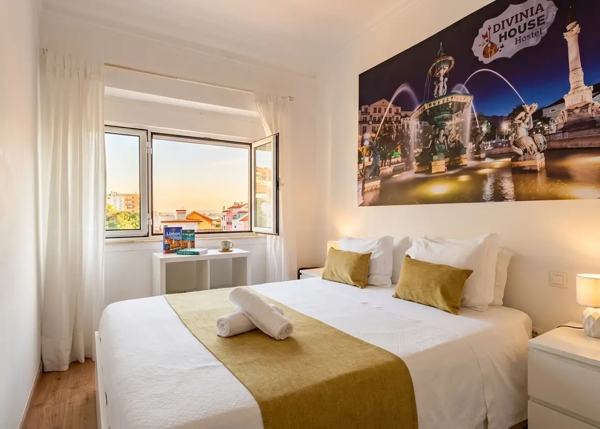 Bright bedroom at Divine House of Graça with city view in Lisbon